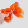 haarclip-oranje-kleding.png