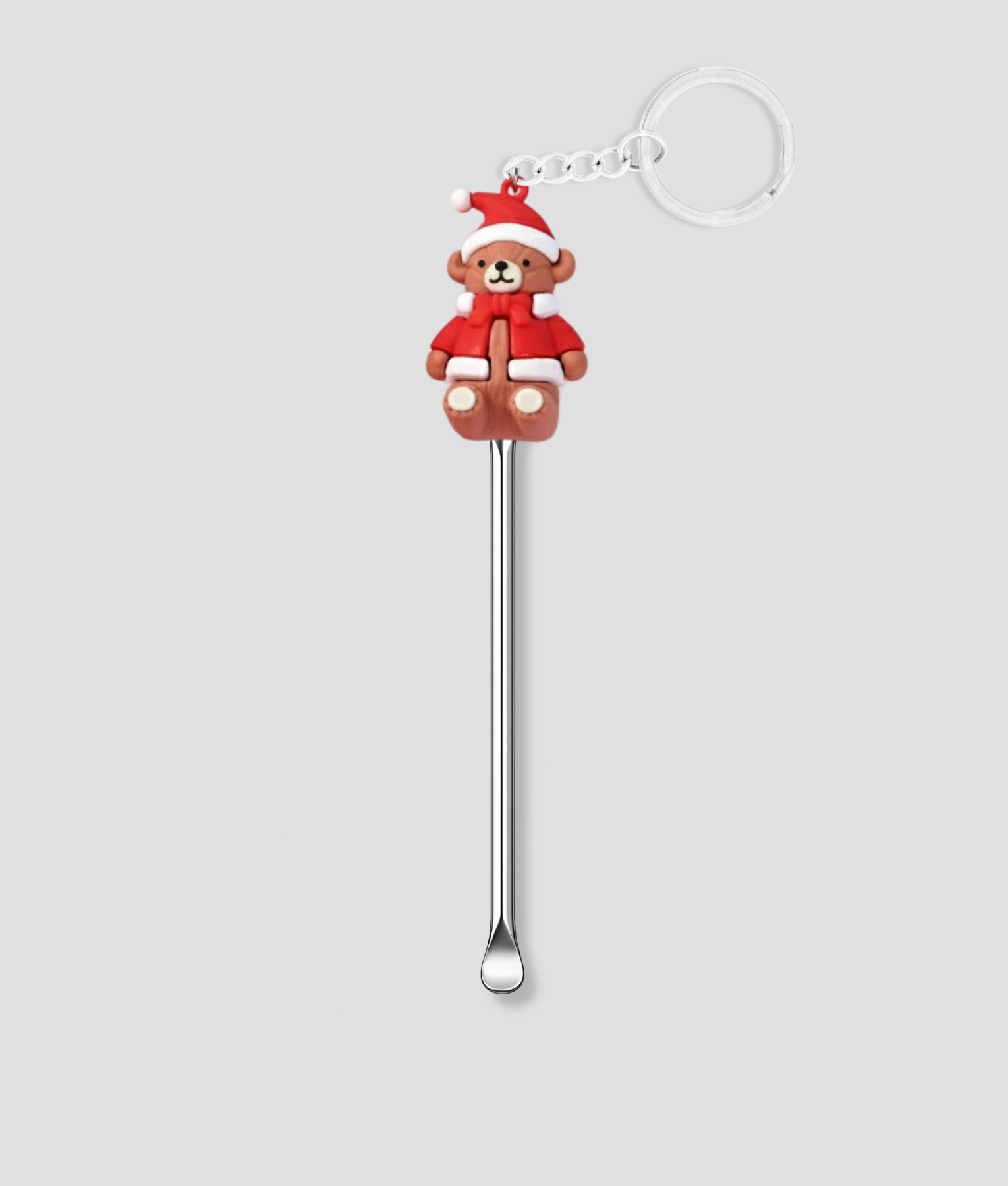 schep met kerstpoppetje