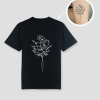 Zwart unisex t-shirt met bloemen boeket tattoo opdruk van PEP SCHEP – witte botanische bloem illustratie op de voorkant, eigen tattoo uploadbaar als print