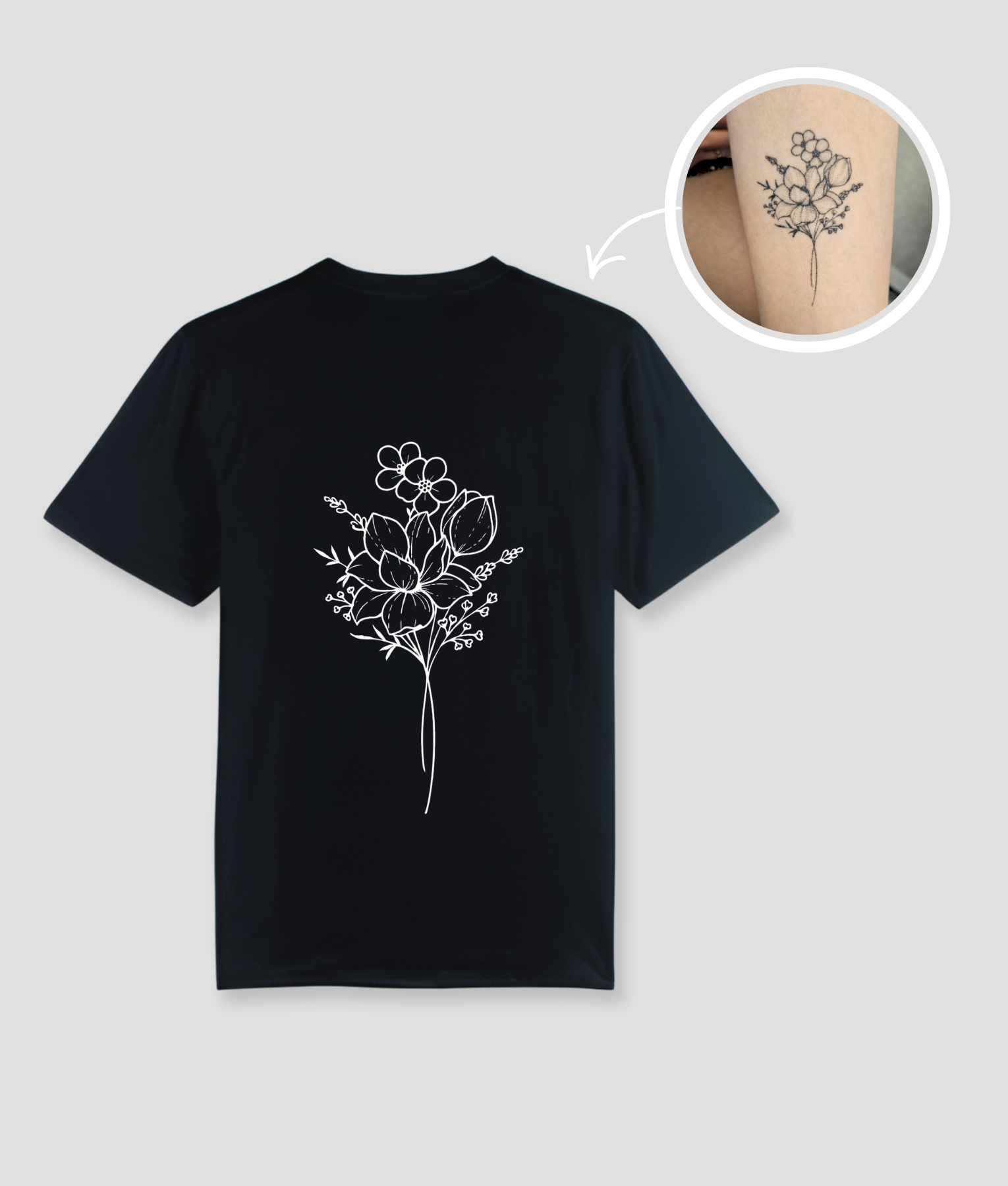 Zwart unisex t-shirt met bloemen boeket tattoo opdruk van PEP SCHEP – witte botanische bloem illustratie op de voorkant, eigen tattoo uploadbaar als print
