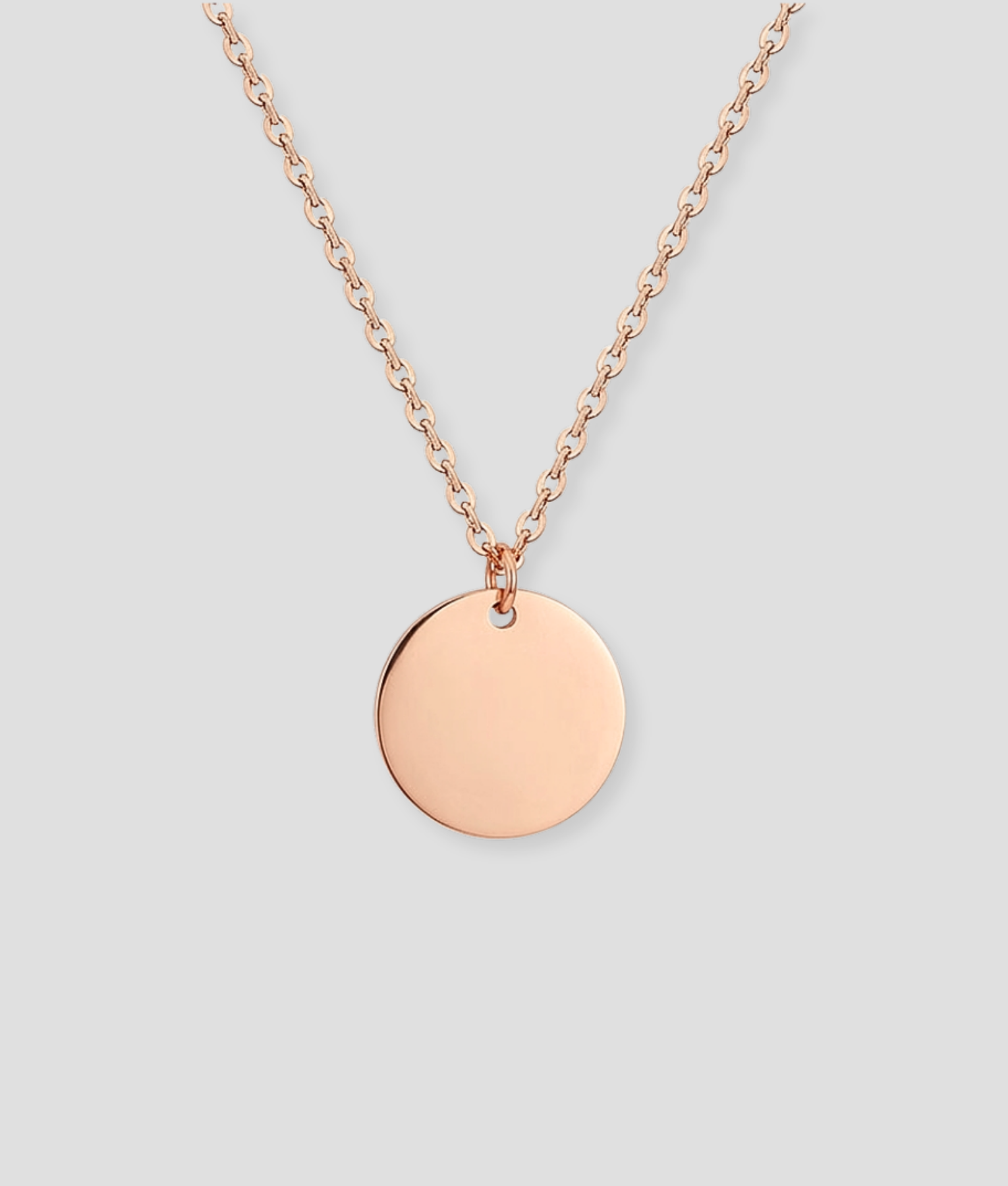 Rosé gouden ronde schijfvormige hanger aan rosé gouden schakelketting gepersonaliseerd rosé gouden sieraad te graveren met eigen naam of tekst