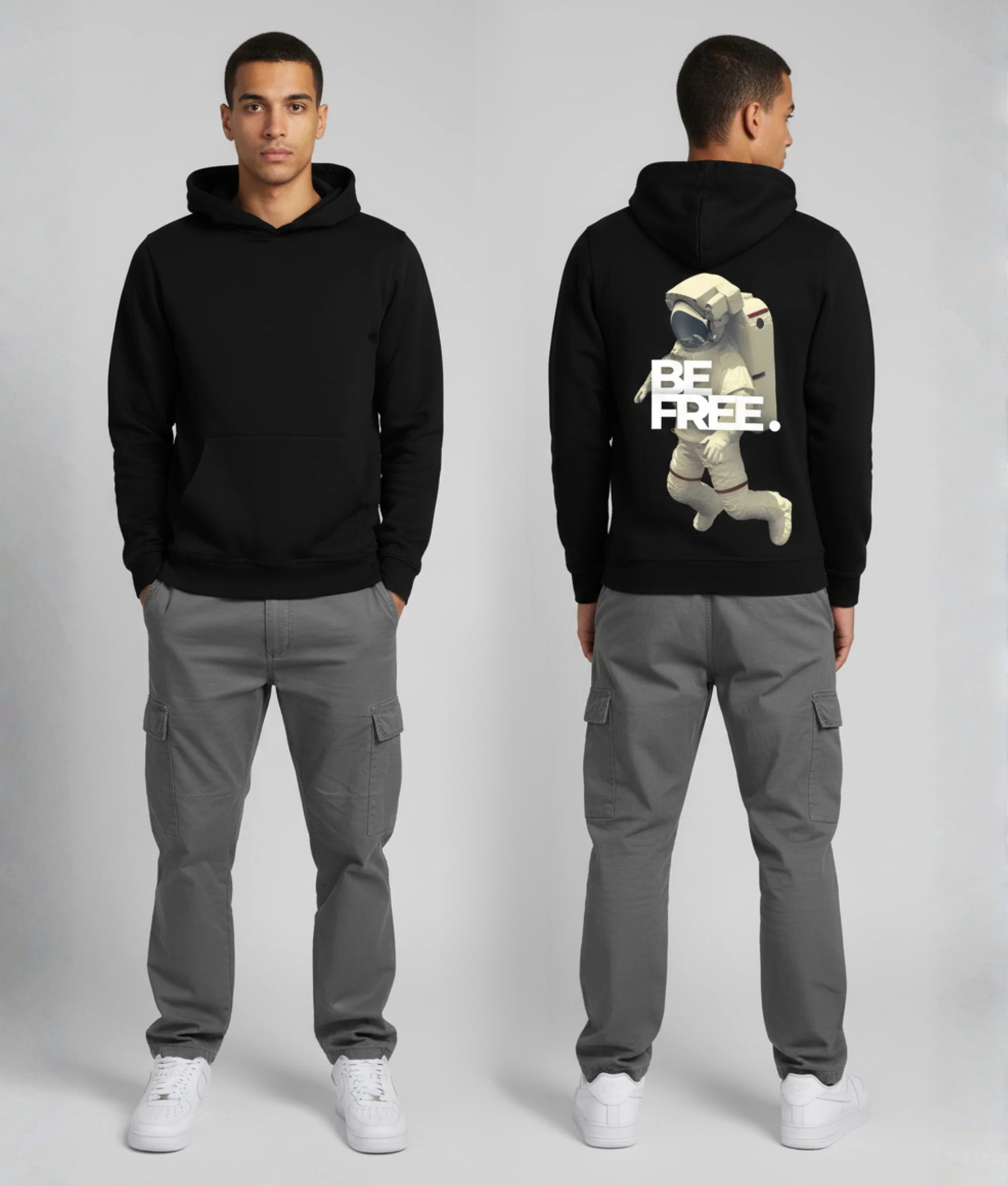Man in zwarte hoodie voor- en achterkant met astronaut en BE FREE print op de rug