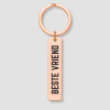 Rosé gouden metalen sleutelhanger met zwarte tekst BESTE VRIEND