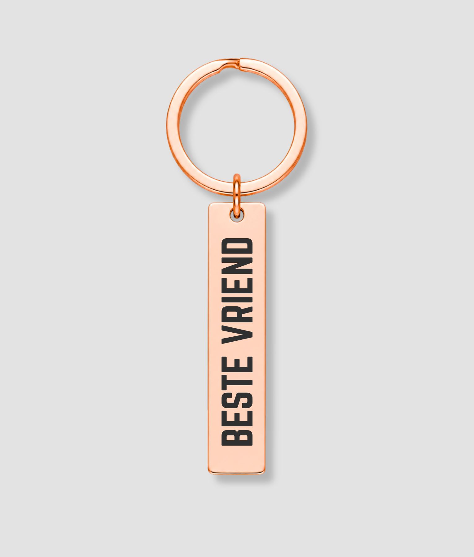 Rosé gouden metalen sleutelhanger met zwarte tekst BESTE VRIEND