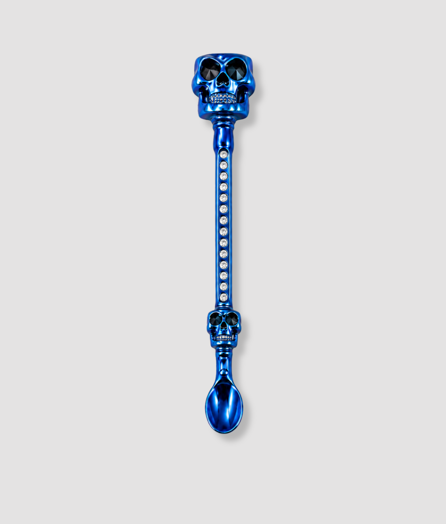 Blauwe doodskop mini schep cocktailstirrer met twee schedel figuren en kristallen steel grappig feest accessoire