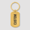 Gouden RVS dog tag sleutelhanger met zwarte tekst CUSTOM gravure
