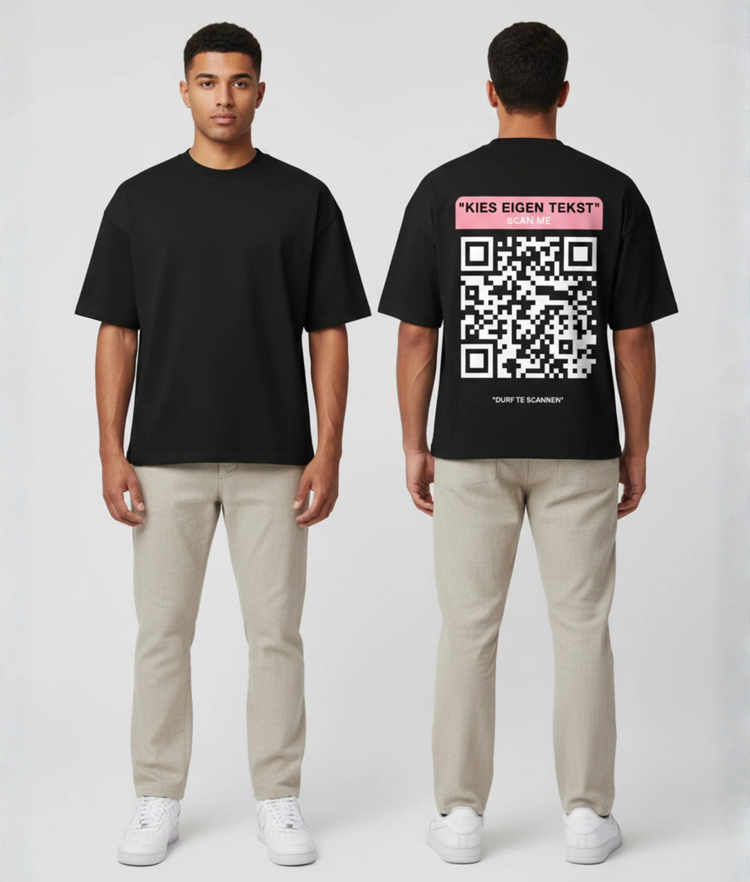Zwart T-shirt met roze eigen tekst banner, grote witte QR-code en DURF TE SCANNEN tekst op de rug