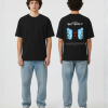 Zwart T-shirt met NO FEAR BUTTERFLY tekst, blauwe en rode vlinder illustratie met bos achtergrond op de rug