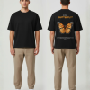 Zwart T-shirt met NO FEAR BUTTERFLY tekst en grote oranje vlinder illustratie op de rug