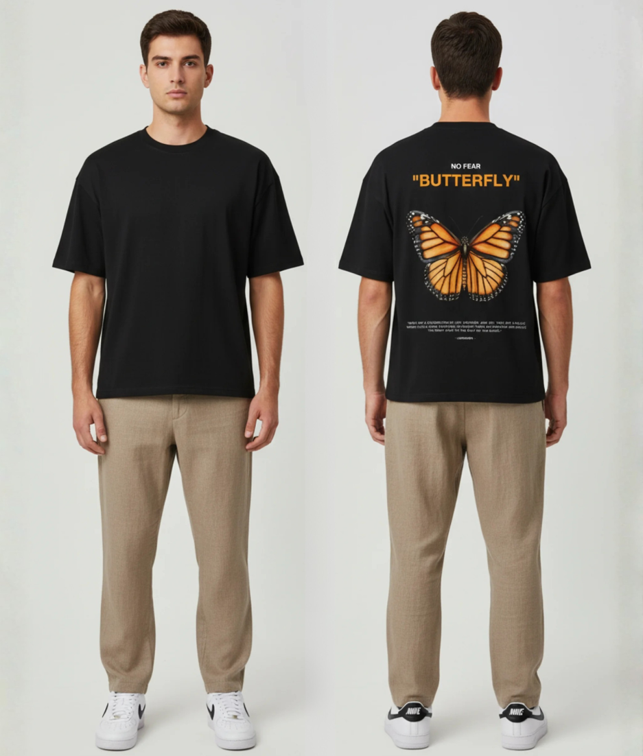 Zwart T-shirt met NO FEAR BUTTERFLY tekst en grote oranje vlinder illustratie op de rug