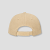 Achterkant beige cap met verstelbare klittenband sluiting