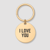 Ronde gouden sleutelhanger met zwarte tekst I LOVE YOU gravure