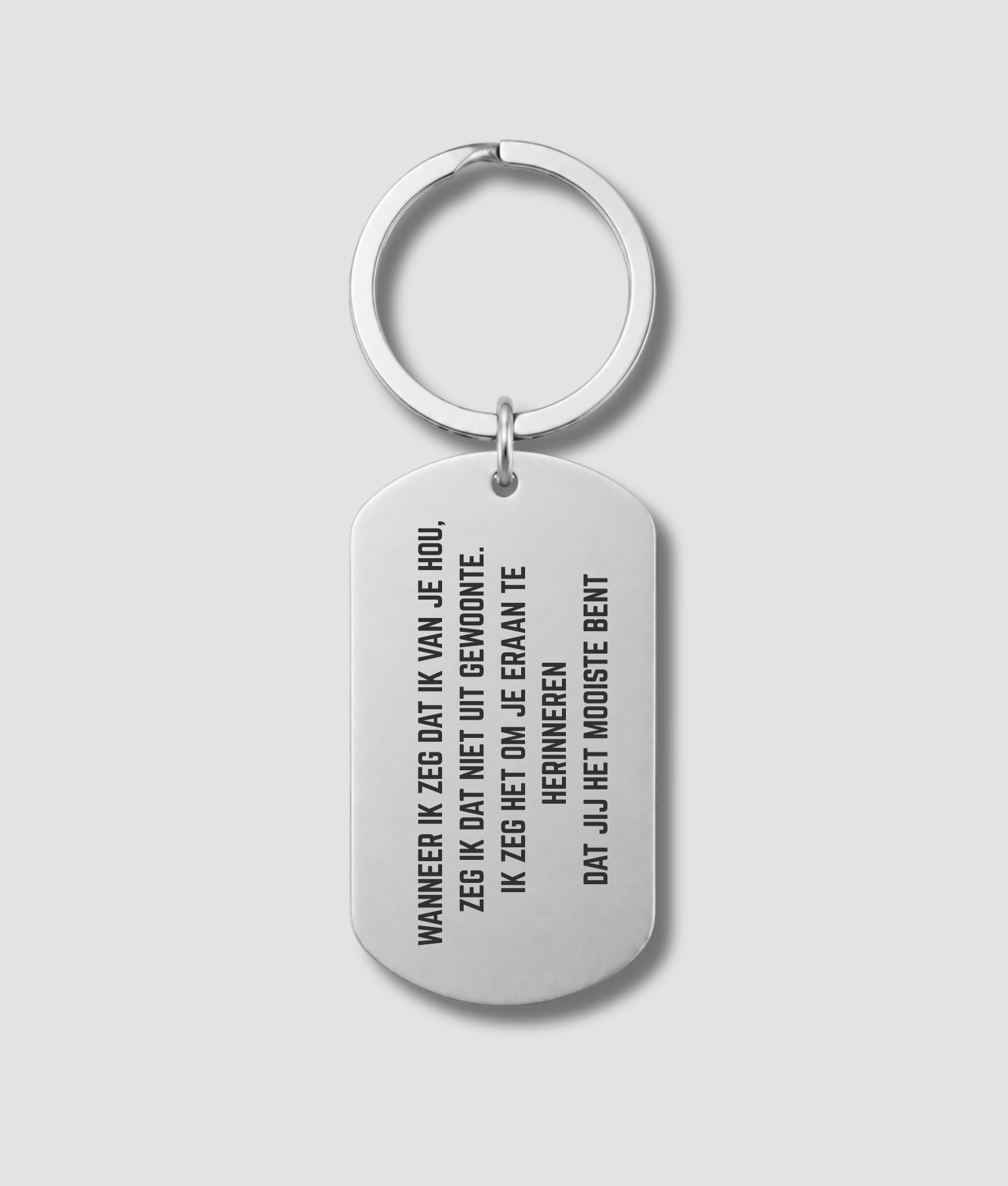 Zilveren dog tag sleutelhanger met eigen tekst gravure