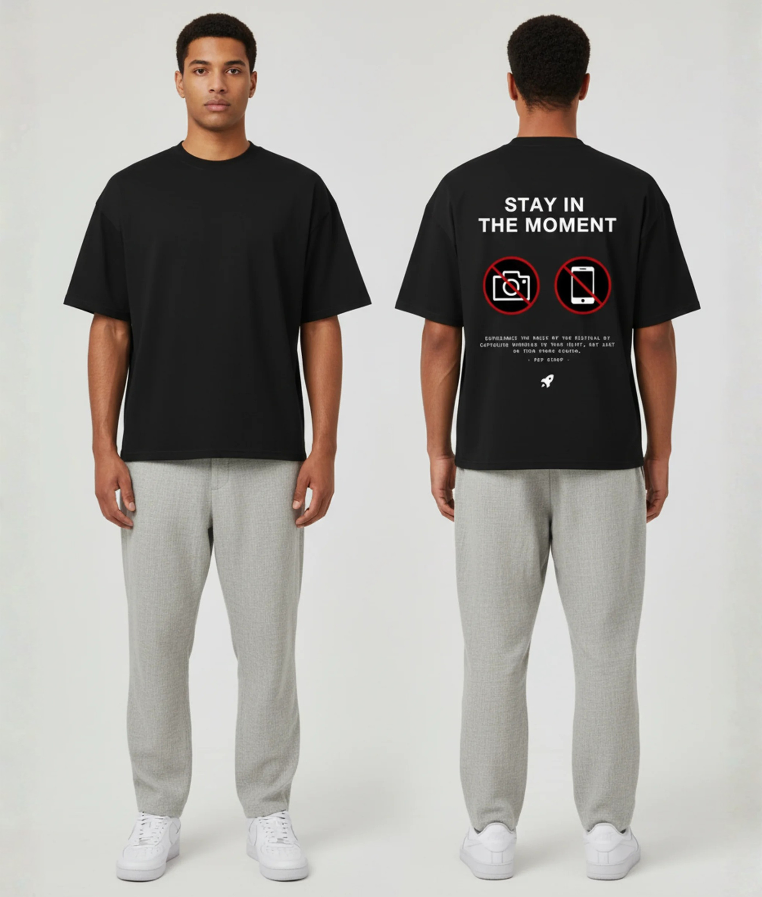 Zwart T-shirt met STAY IN THE MOMENT tekst en no-foto en no-phone iconen op de rug