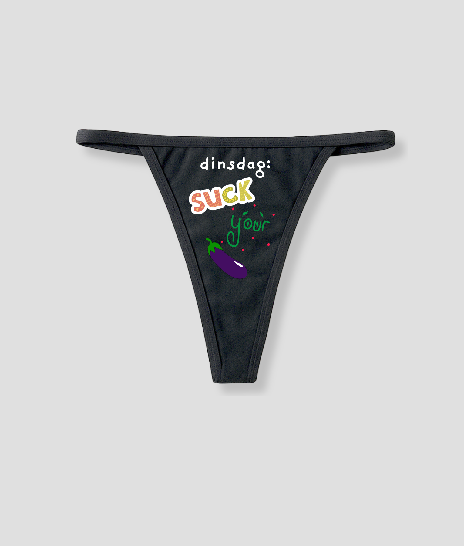 Zwarte string met grappige dinsdag Suck Your tekst en aubergine illustratie onderdeel van de 7-daagse string bundel