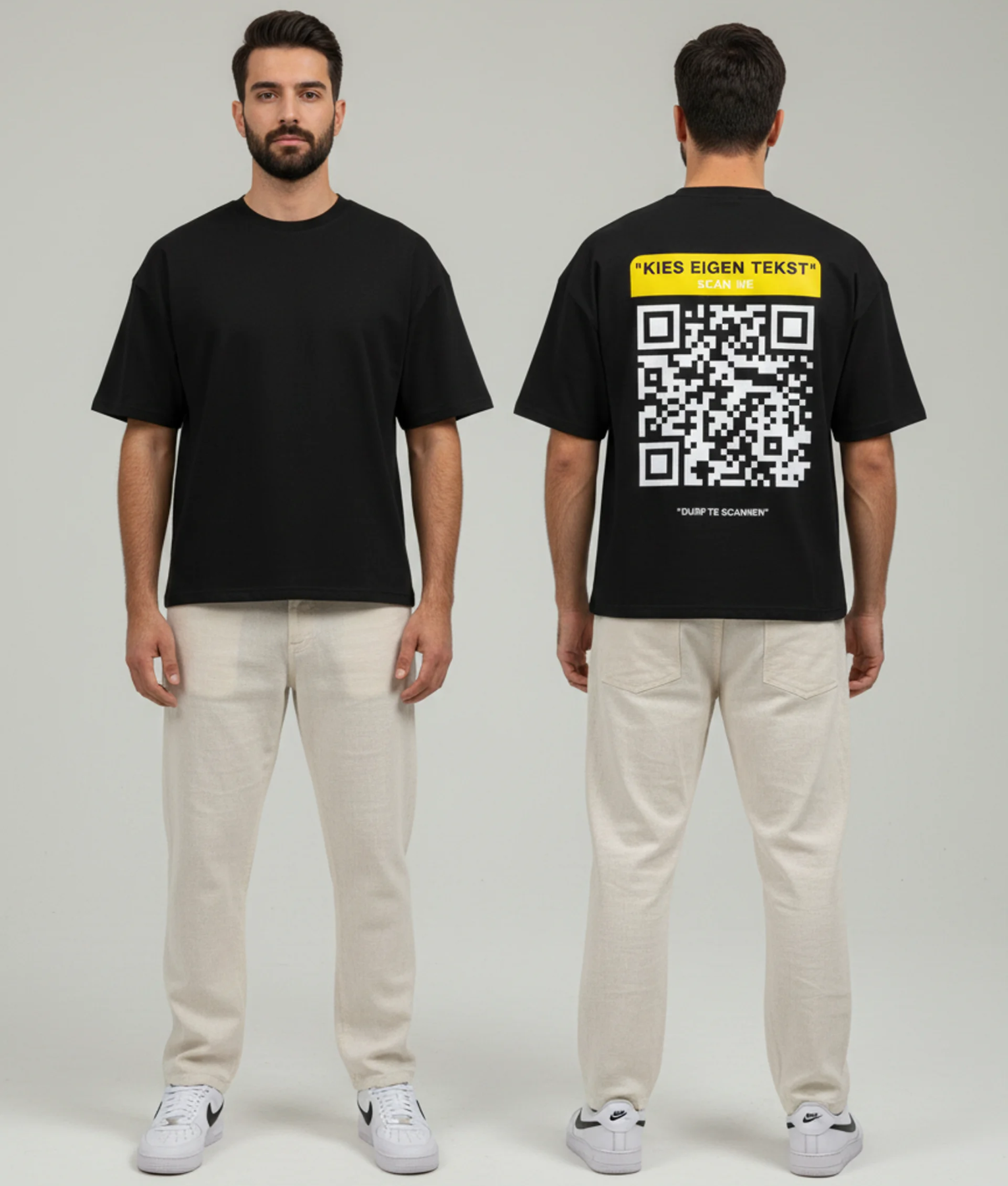 Zwart T-shirt met gele eigen tekst banner, grote witte QR-code en DURF TE SCANNEN tekst op de rug