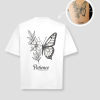 Wit unisex t-shirt met 'Patience' vlinder en bloemen tattoo opdruk van PEP SCHEP – grote zwarte botanische vlinder illustratie op de voorkant