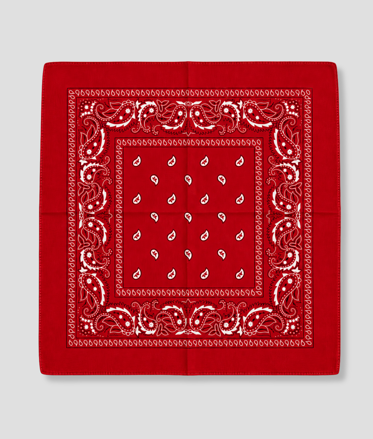 Rode bandana met witte paisley print, plat gevouwen