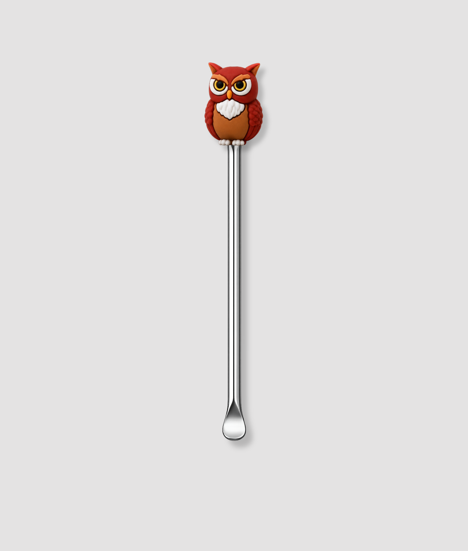Mini schepje cocktailstirrer met bruine uil figuur met grote gele ogen en witte borst bovenop en zilveren steel