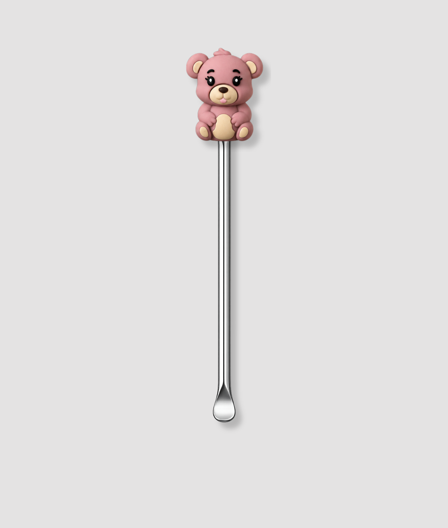 Mini schepje cocktailstirrer met roze teddybeer figuur met grote ogen en beige buik bovenop en zilveren steel