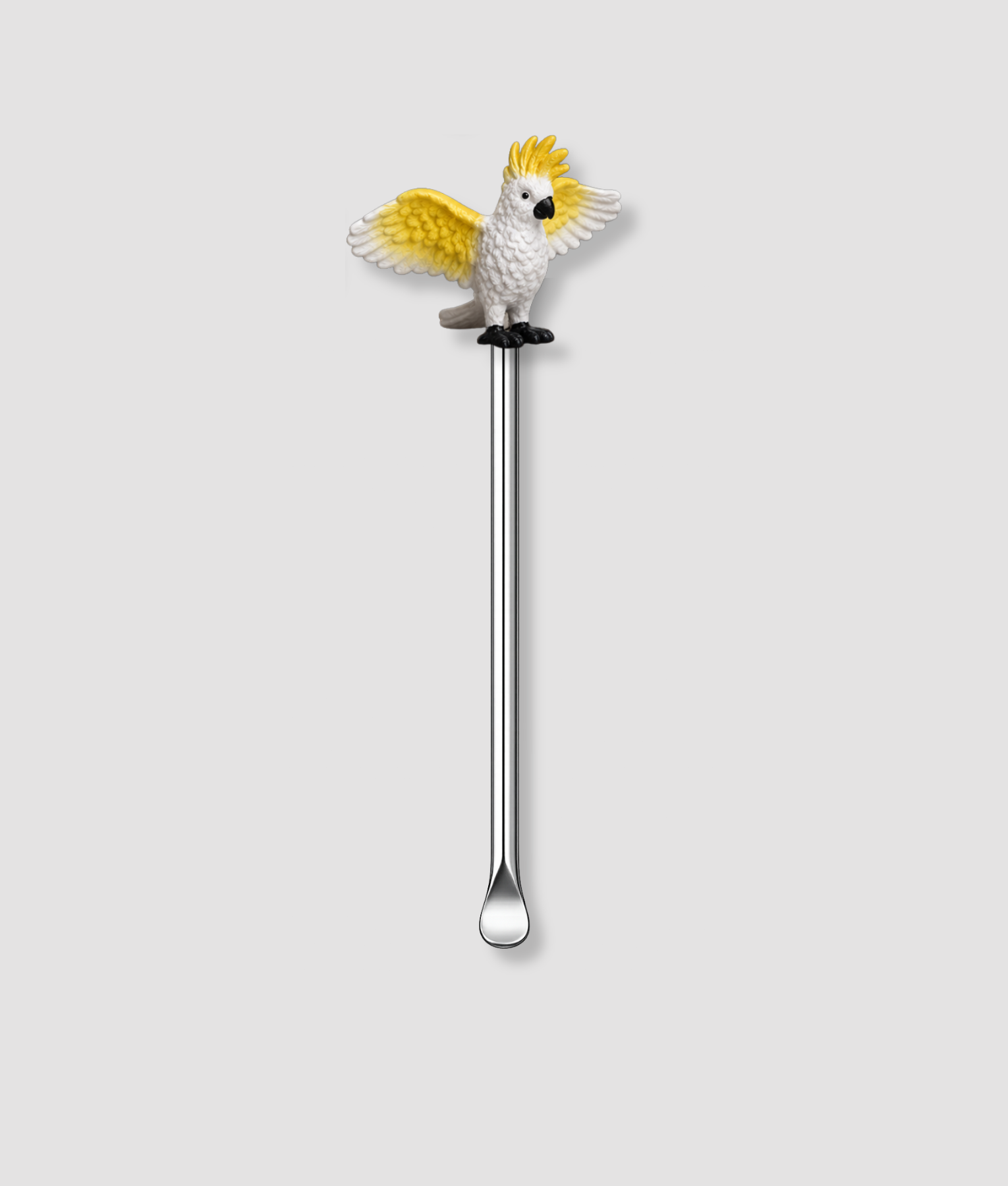 Mini schepje cocktailstirrer met witte kaketoe papegaai figuur met gele kuif bovenop en zilveren steel