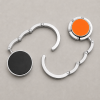 Tassenhanger geopend en ingeklapt zilver oranje met zwart detail
