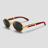 Rood-bruine ronde retro festival zonnebril met vintage uitstraling