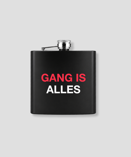 Zwarte zakfles met GANG IS ALLES tekst in rood en wit als grappig cadeau