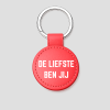 Rode ronde leren sleutelhanger met tekst 'GAPPIE'
