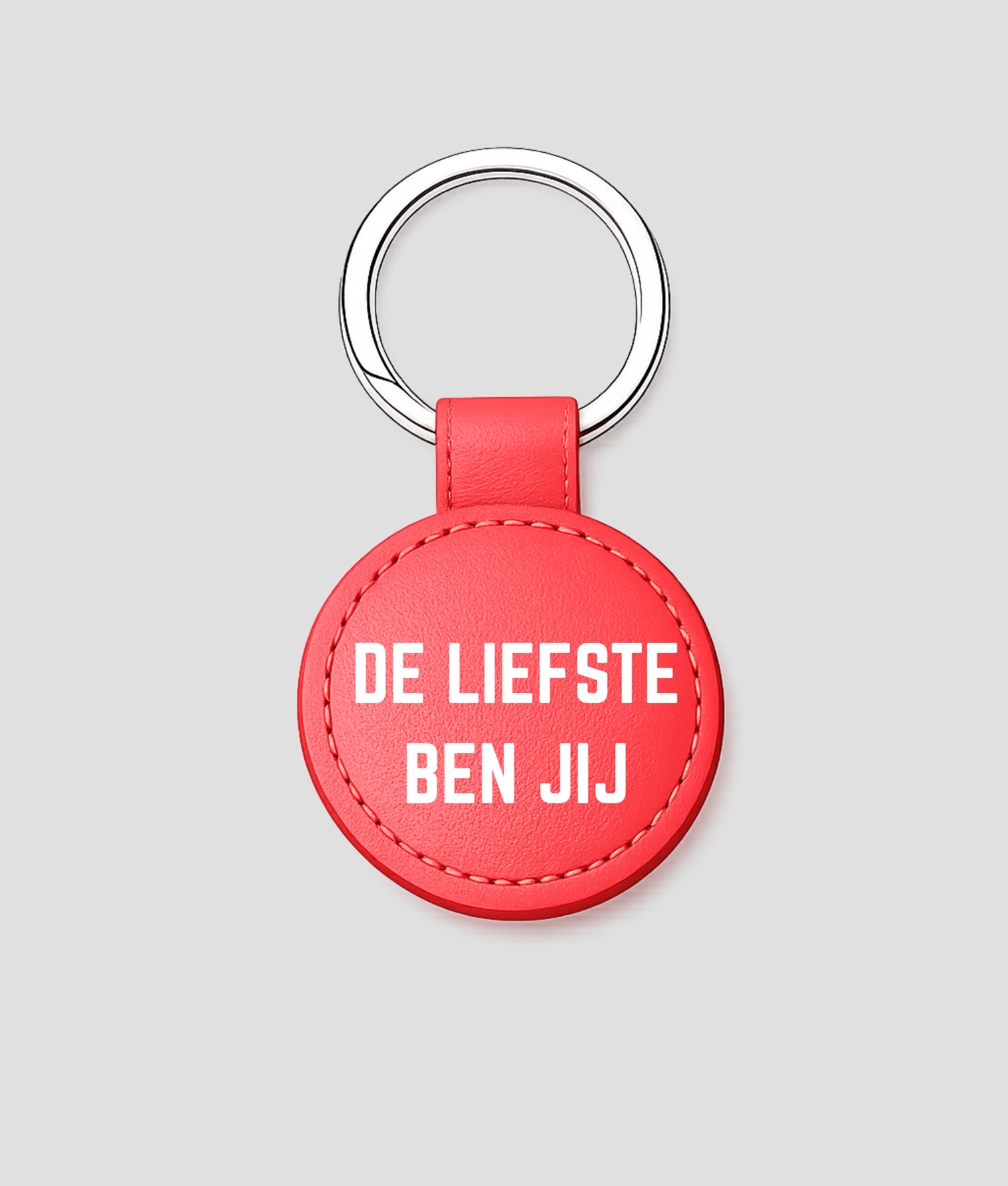 Rode ronde leren sleutelhanger met tekst 'GAPPIE'