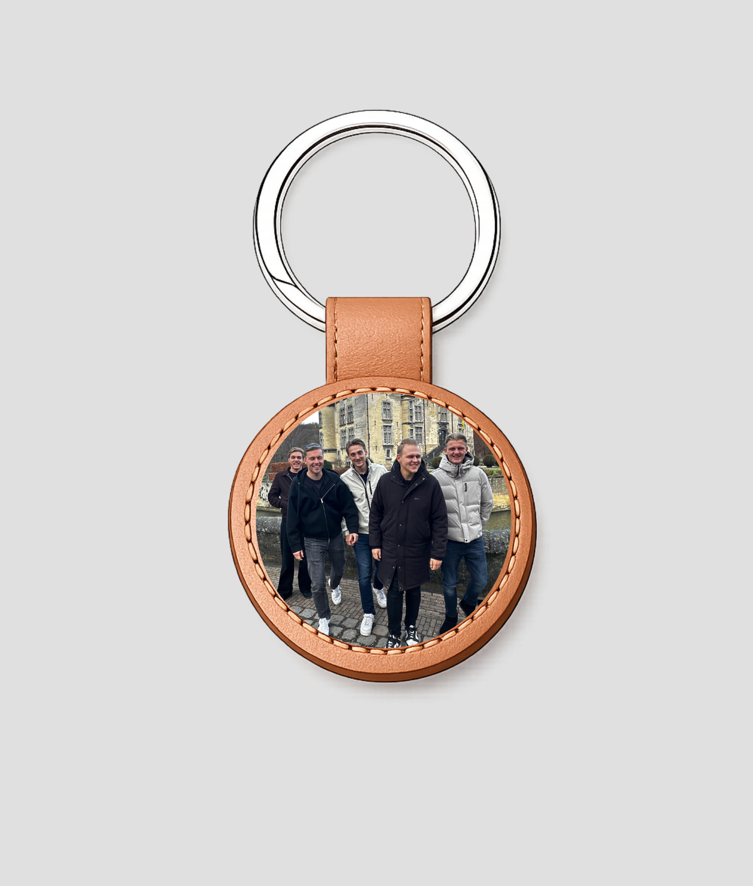 Koperkleurige ronde leren sleutelhanger met eigen feestfoto