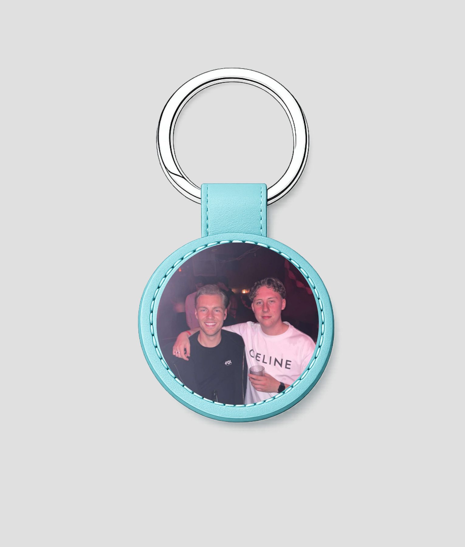 Turquoise ronde leren sleutelhanger met eigen feestfoto