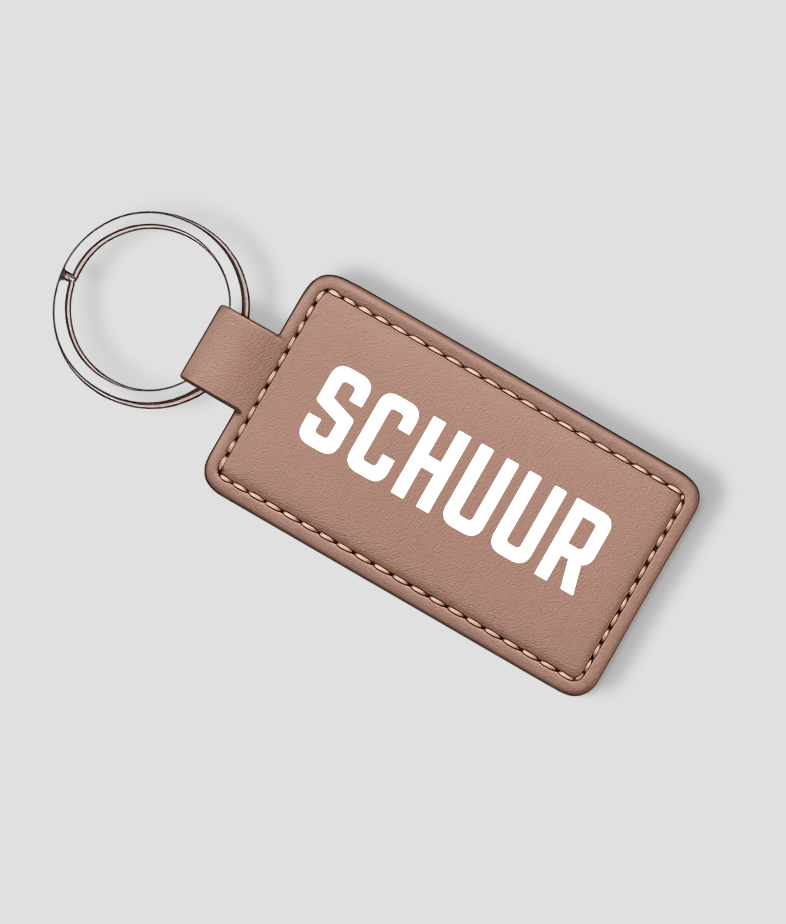 Lichtbruine leren sleutelhanger die je zelf kunt personaliseren met eigen tekst