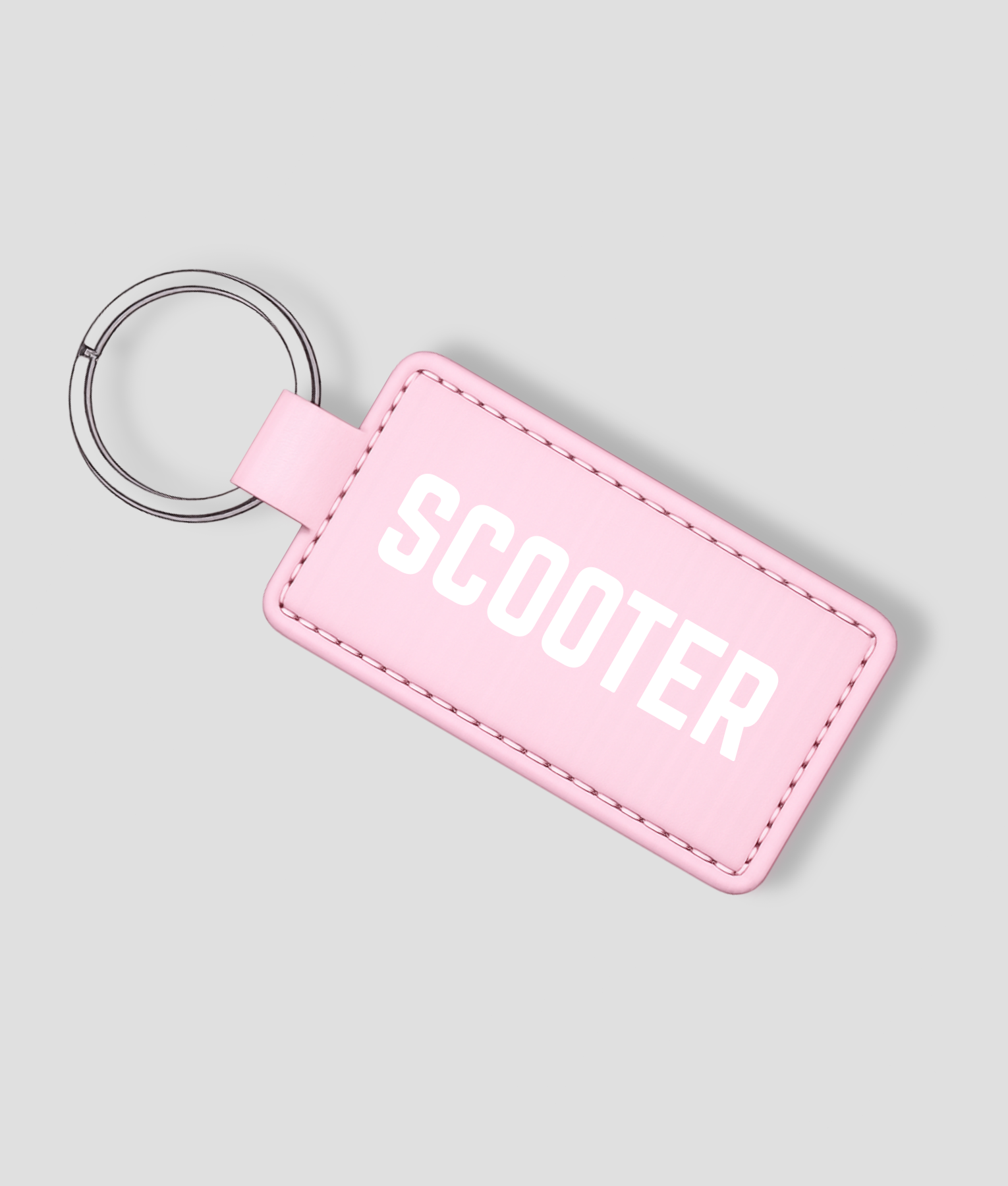 Roze leren sleutelhanger die je zelf kunt personaliseren met eigen tekst