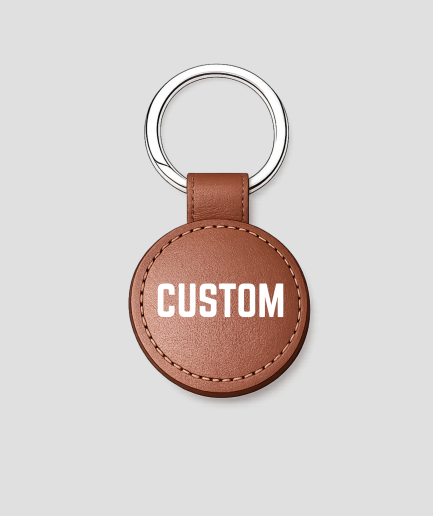 Bruine ronde leren sleutelhanger, voorbeeldtekst 'CUSTOM'
