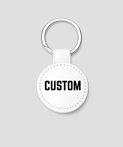 Witte ronde leren sleutelhanger met zilveren ring, voorbeeldtekst 'CUSTOM'