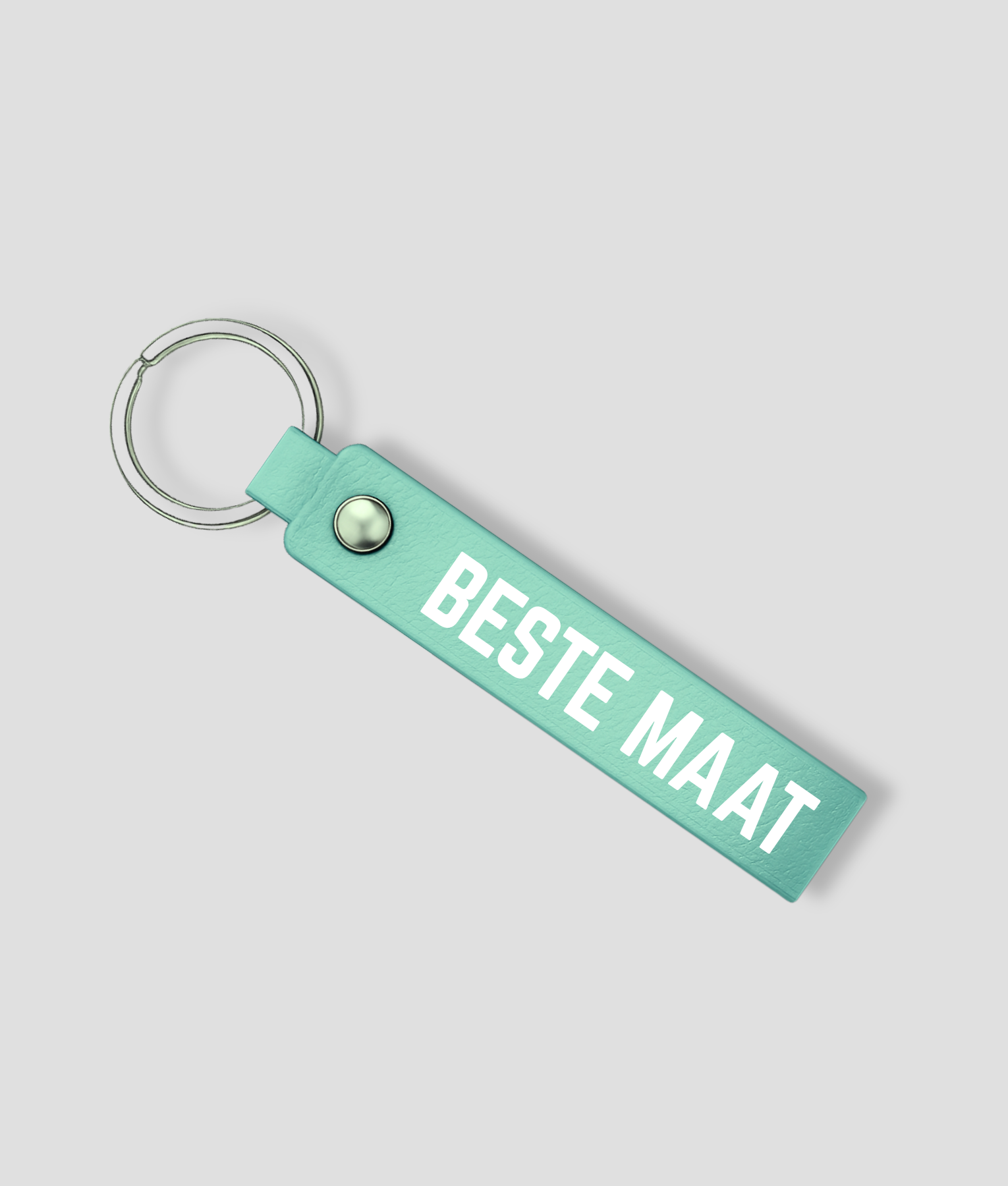 Mintgroene leren sleutelhanger met zilveren ring en tekst 'BESTE MAAT'