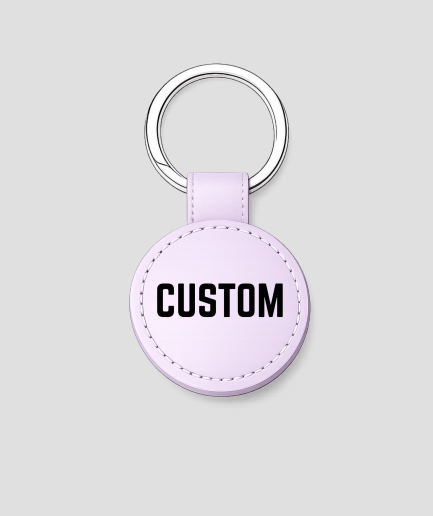 Lila ronde leren sleutelhanger met zilveren ring, voorbeeldtekst 'CUSTOM'