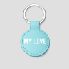 Turquoise ronde leren sleutelhanger met zilveren ring en tekst 'BESTE JUF'