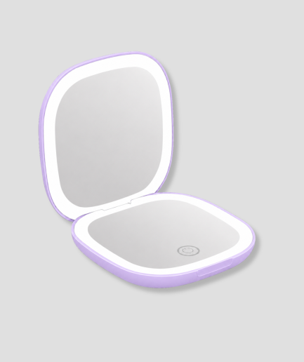 Kleine paarse LED make-up spiegel in zakformaat, opengeklapt
