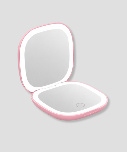 Kleine roze LED make-up spiegel in zakformaat, opengeklapt