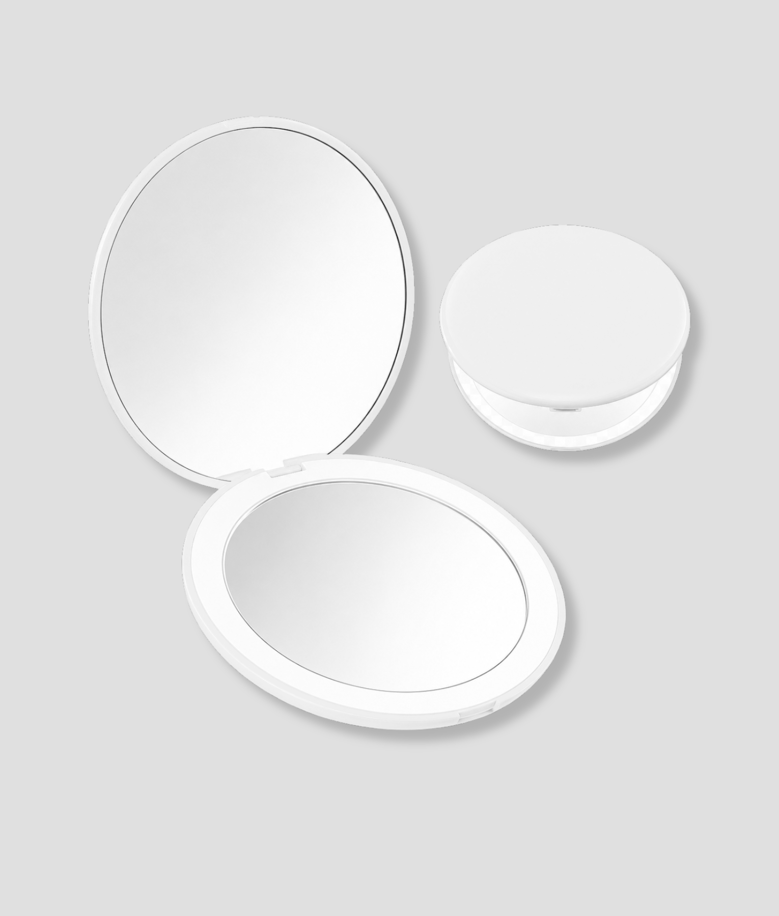 Witte ronde LED make-up spiegel in zakformaat, open en gesloten