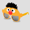Oranje feestbril met grappig gezicht, haar en neus