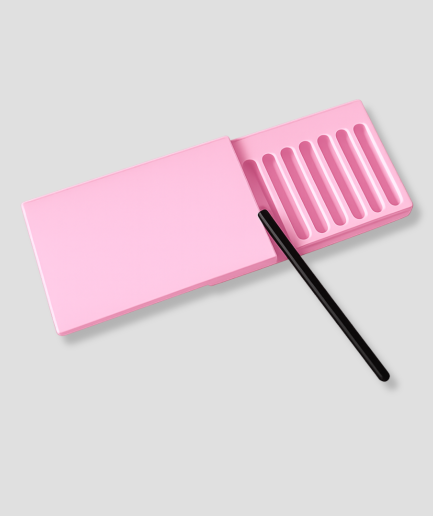 Roze opbergbakje met vakjes en bijpassend buisje