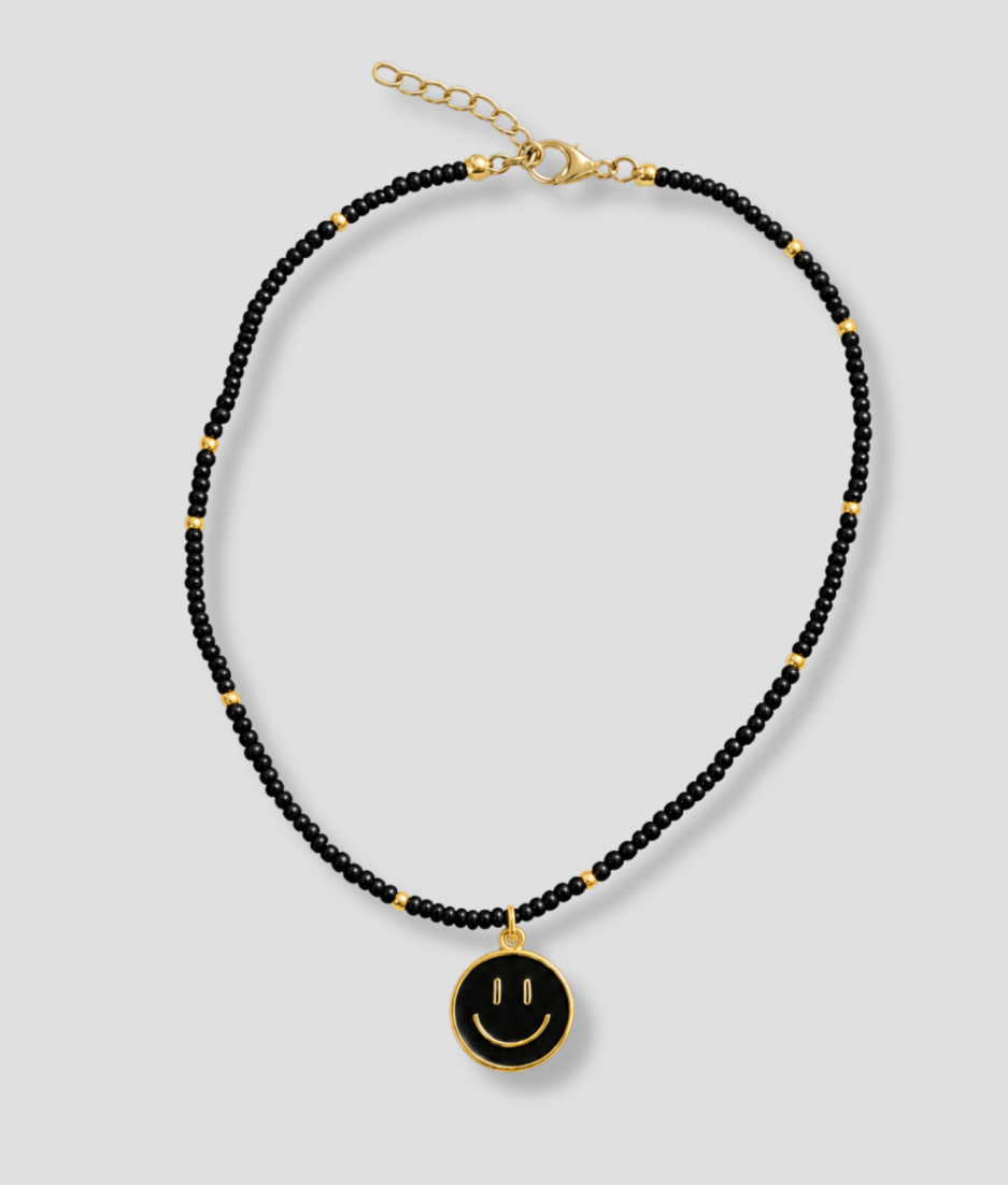 Zwarte kralenketting met gouden smiley hanger - Happy Smiles collectie Pep Schep