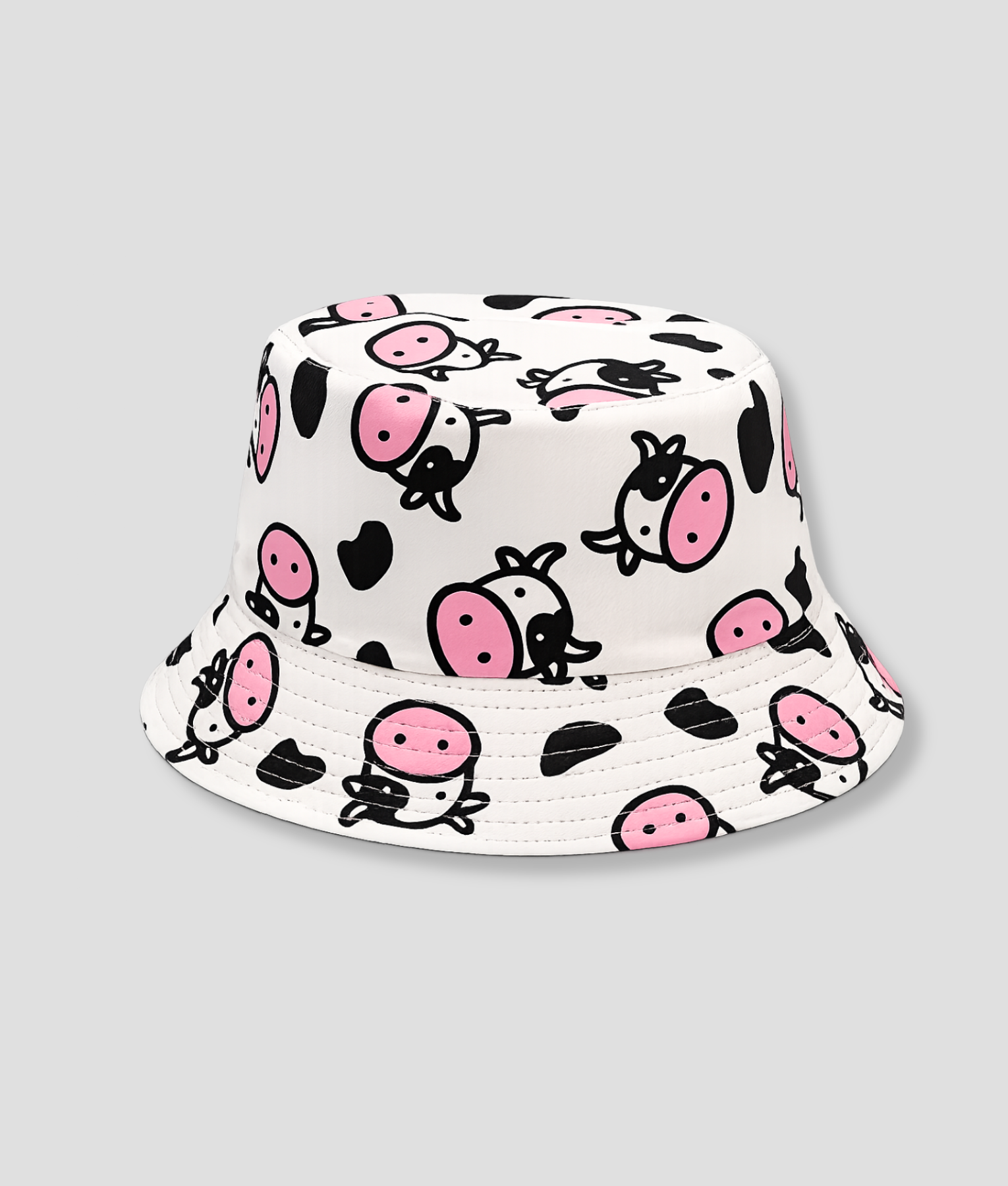 Roze-witte bucket hat met koeienprint